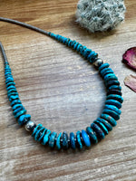 22 inch dark blue graduated turquoise necklace with Sterling silver pearls