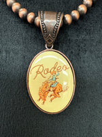 Faux Copper or Silver Beaded Retro Rodeo Pendent